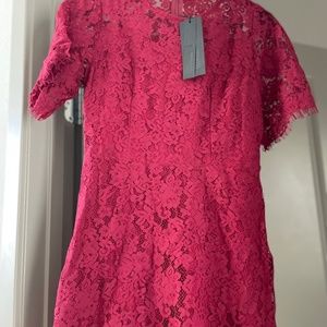 Super cute red lace dress, new with tags. Asking $25. Size M